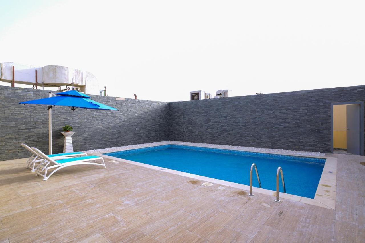Al Aseel Hotel Doha Bagian luar foto