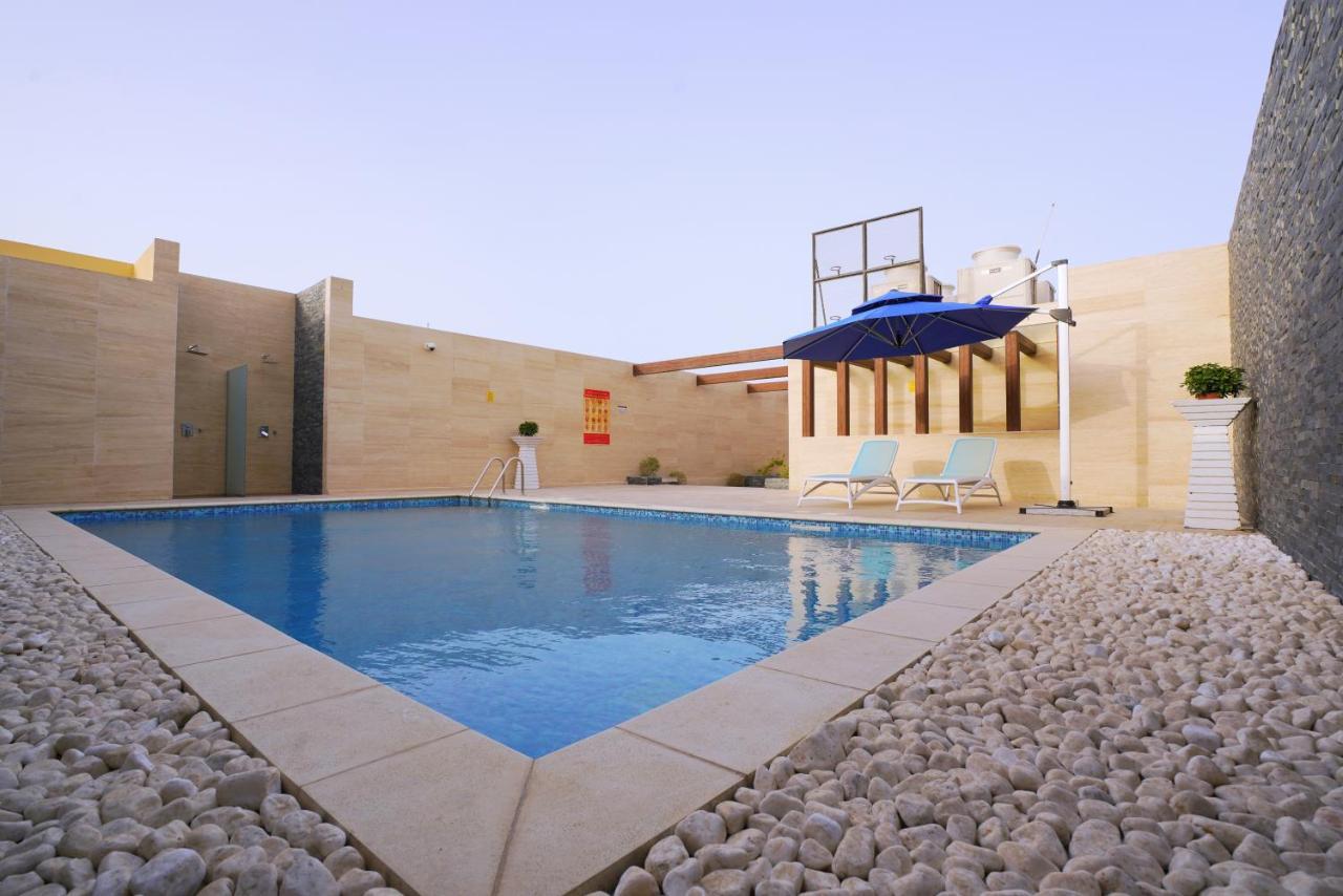 Al Aseel Hotel Doha Bagian luar foto