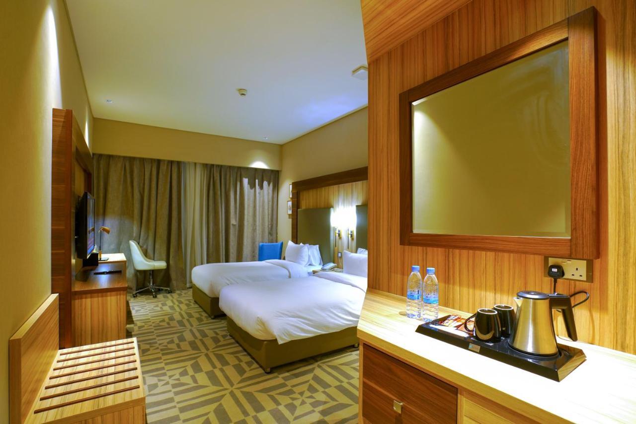 Al Aseel Hotel Doha Bagian luar foto